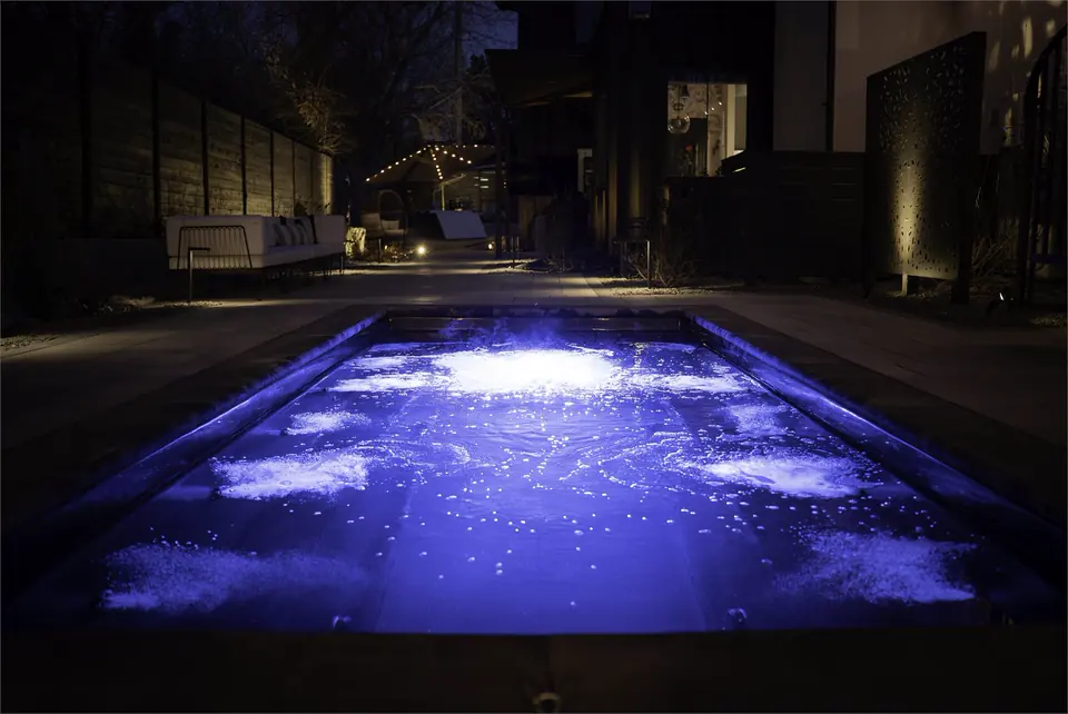 The pool lit at night